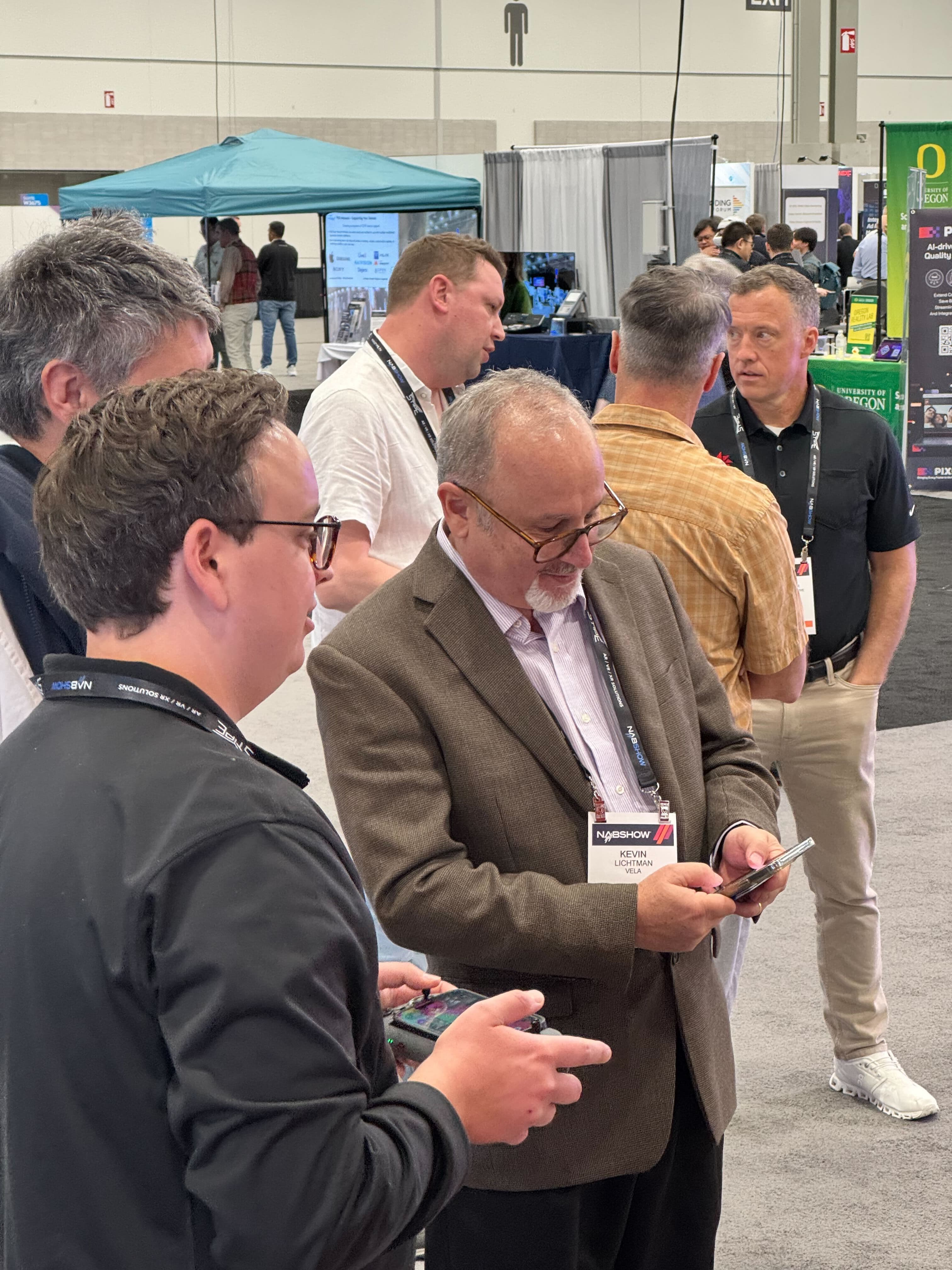 Files.com team in conversation with attendees at NAB Show